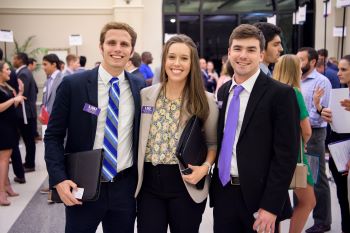 grad students at networking reception