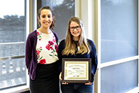 Kelsey Olson with award