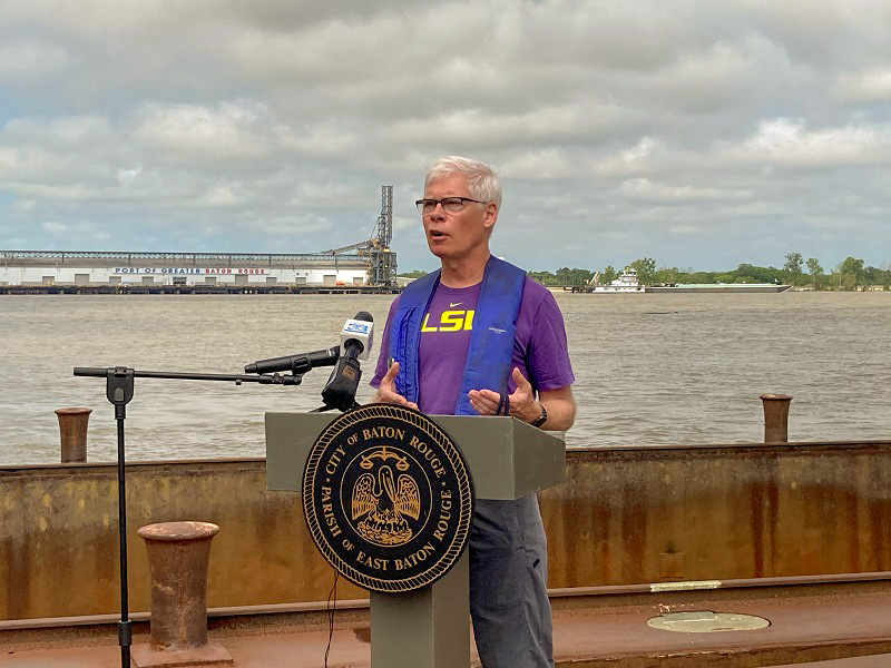 Mark Benfield speaking at a podium