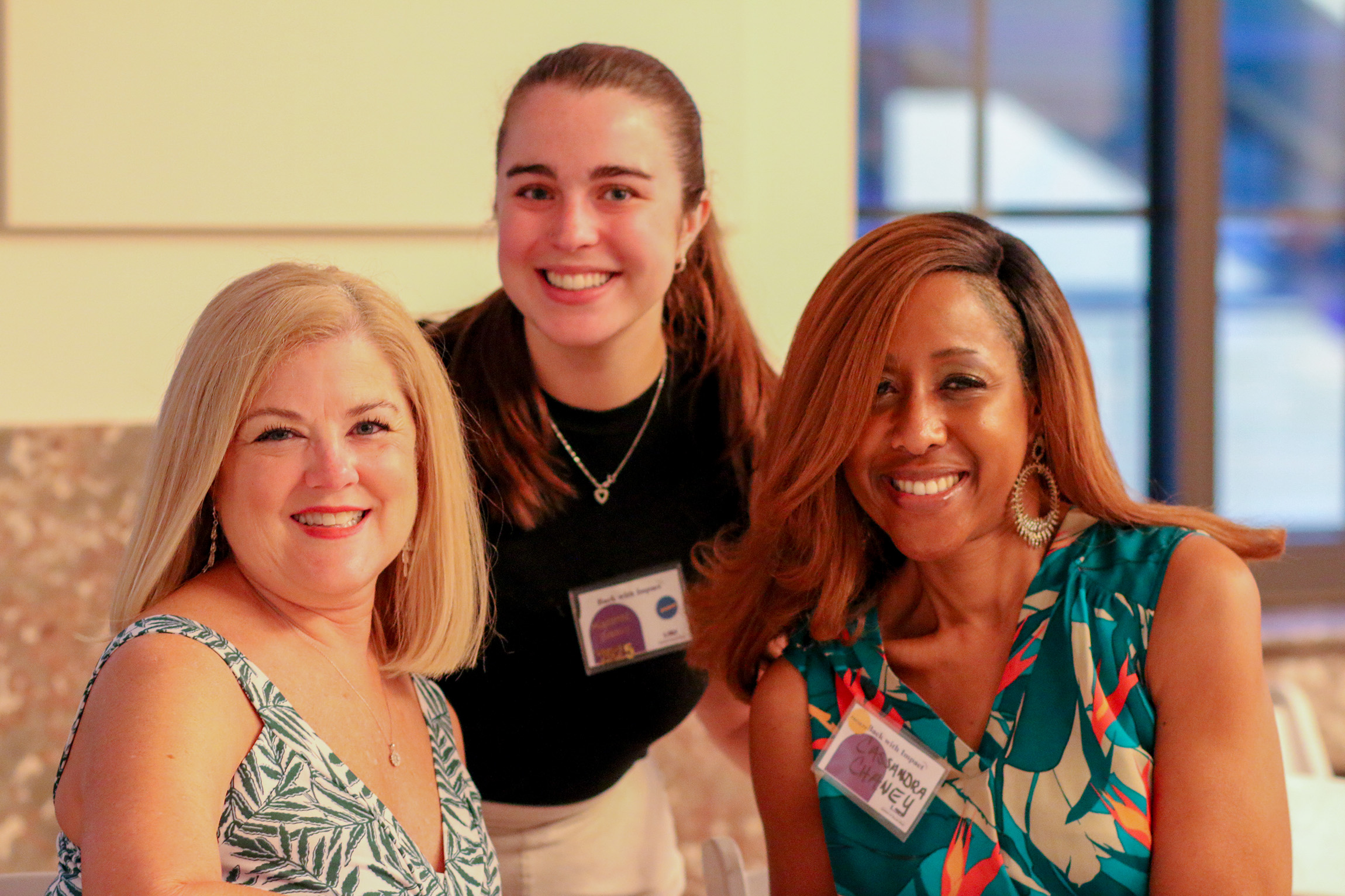 three women smiling