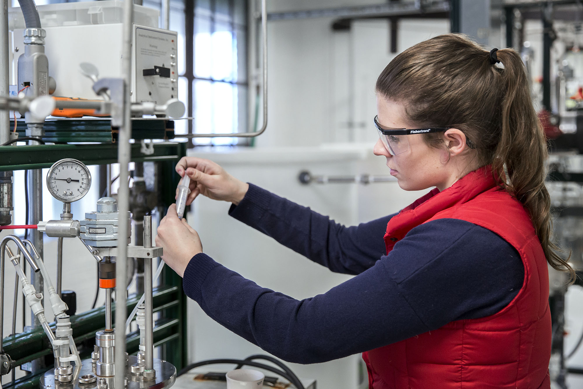 student in chemical engineering lab