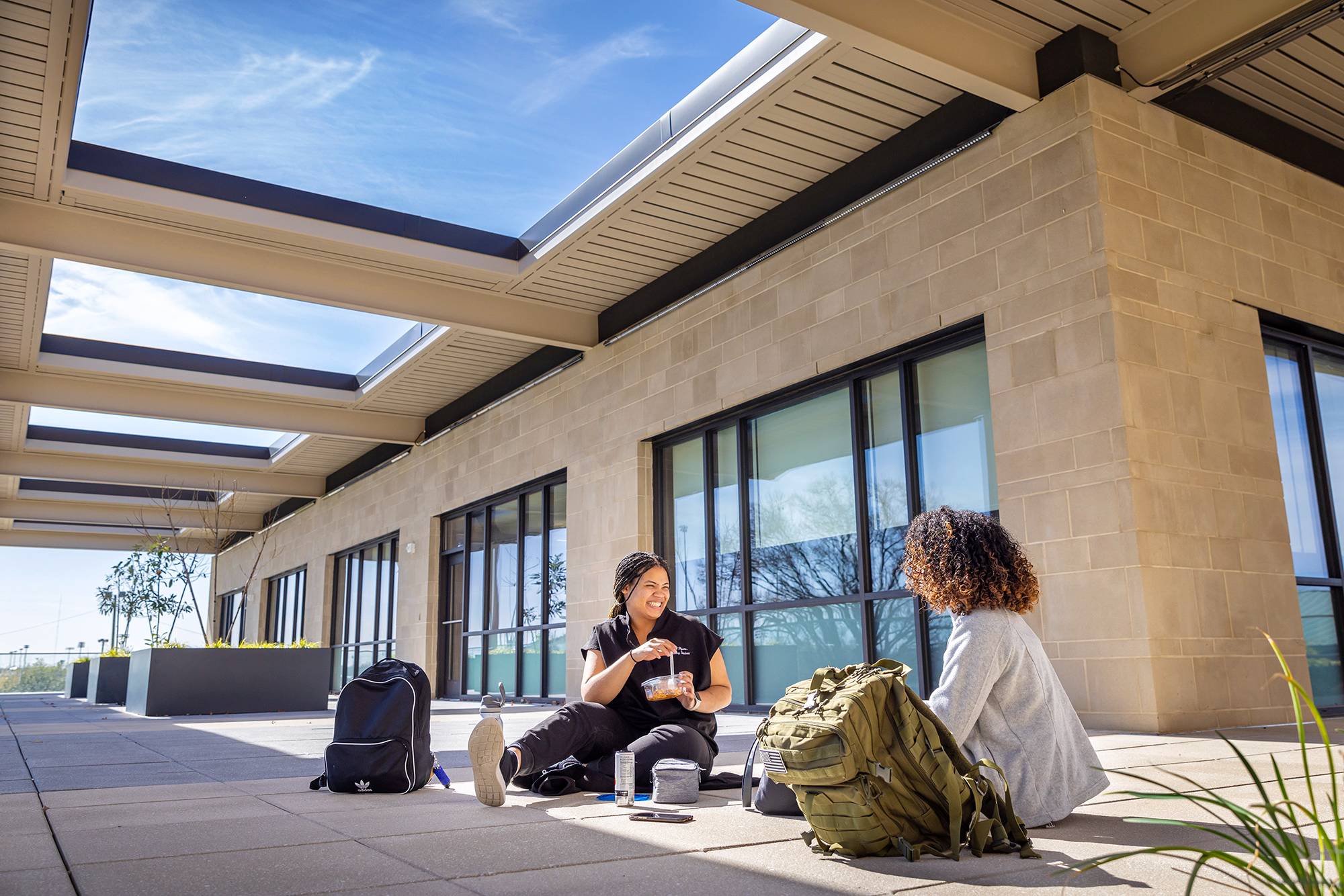 women sitting outside